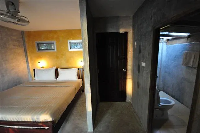 Front Sea View bedroom with the bathroom door open