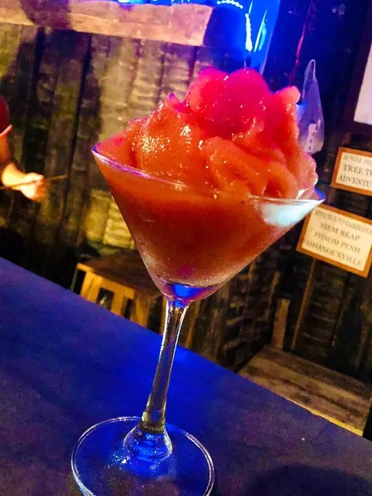 Frozen red cocktail at the bar