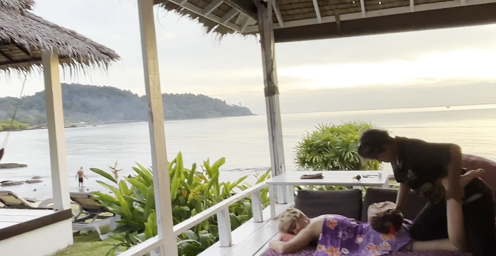 A Thai massage on the deck by the sea, with the island across the bay